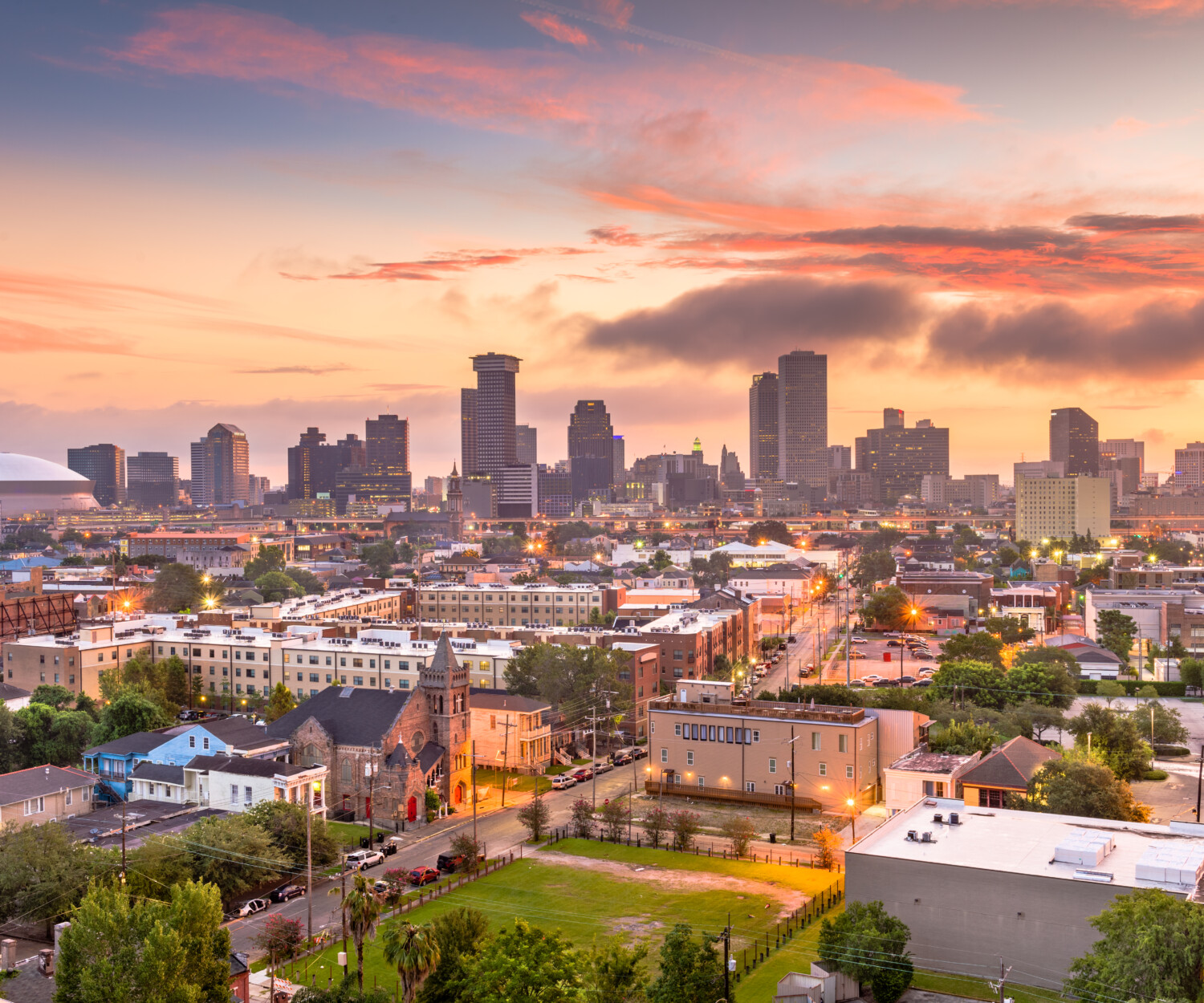 New Orleans, Louisiana, USA downtown city skyline at dawn.